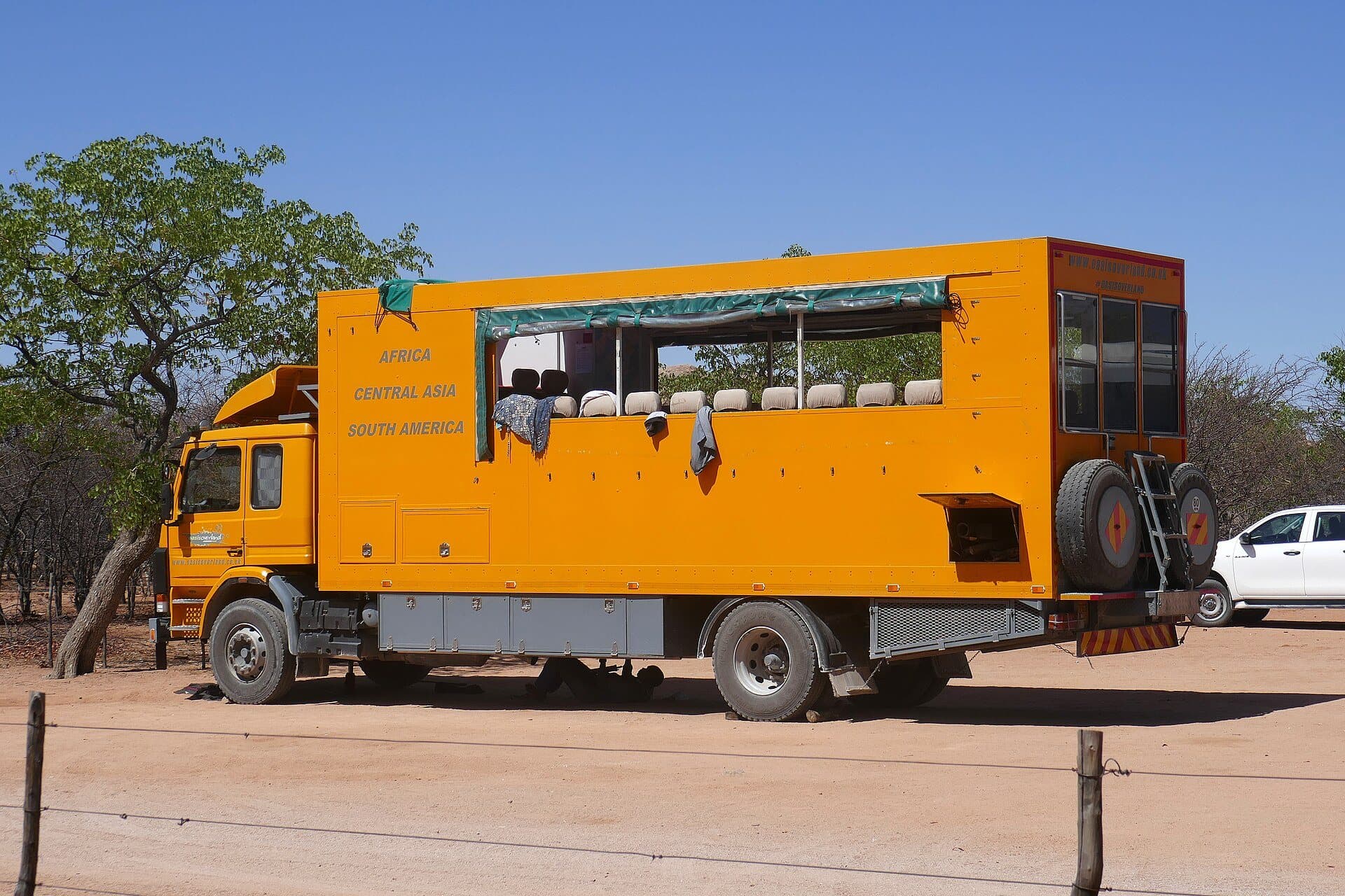 Orange overland tour truck